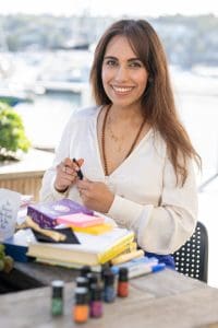 Branding-Photos-Holistic-Brand-Strategist-Sydney-NSW – Professional Photographer Sydney Ext: Holistic Brand Strategist wearing a cream top having her branding photos taken by portrait photographer Georgie Greene in Sydney NSW