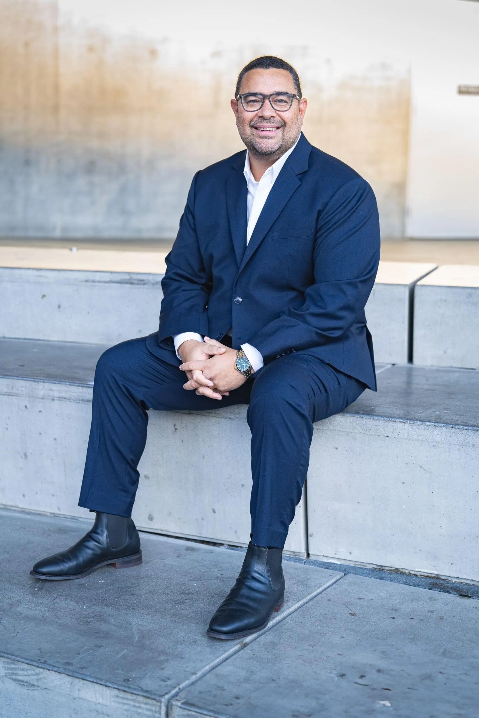 Branding-Headshot-Sydney-NSW Male Finance manager wearing a blue suite and having his business headshot taken by Sydney corporate photographer Georgie Greene