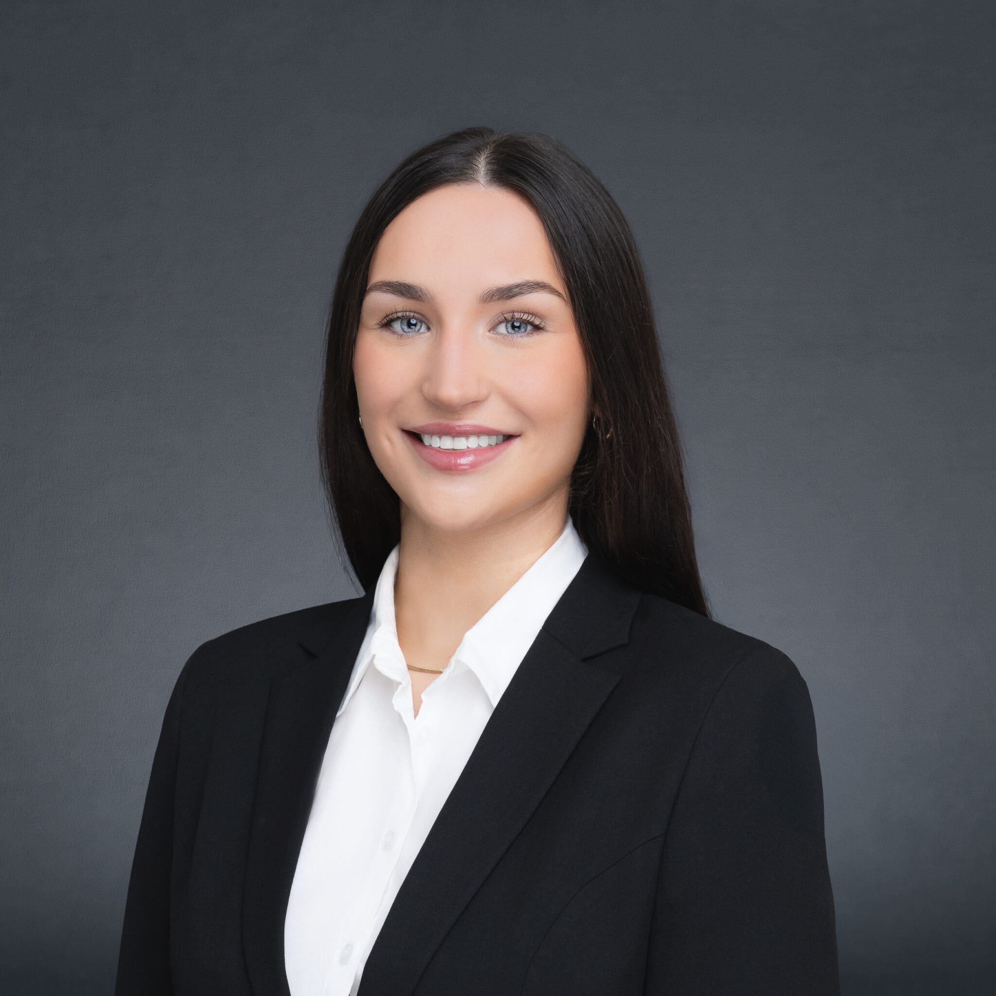 Female Lawyer wearing black and having her corporate headshot taken by Sydney professional photographer Georgie Greene