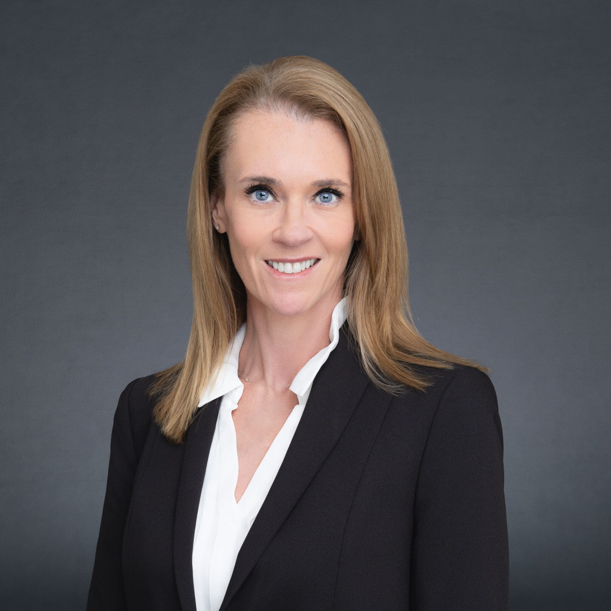Female Lawyer wearing black and having her corporate headshot taken by Sydney Portrait photographer Georgie Greene