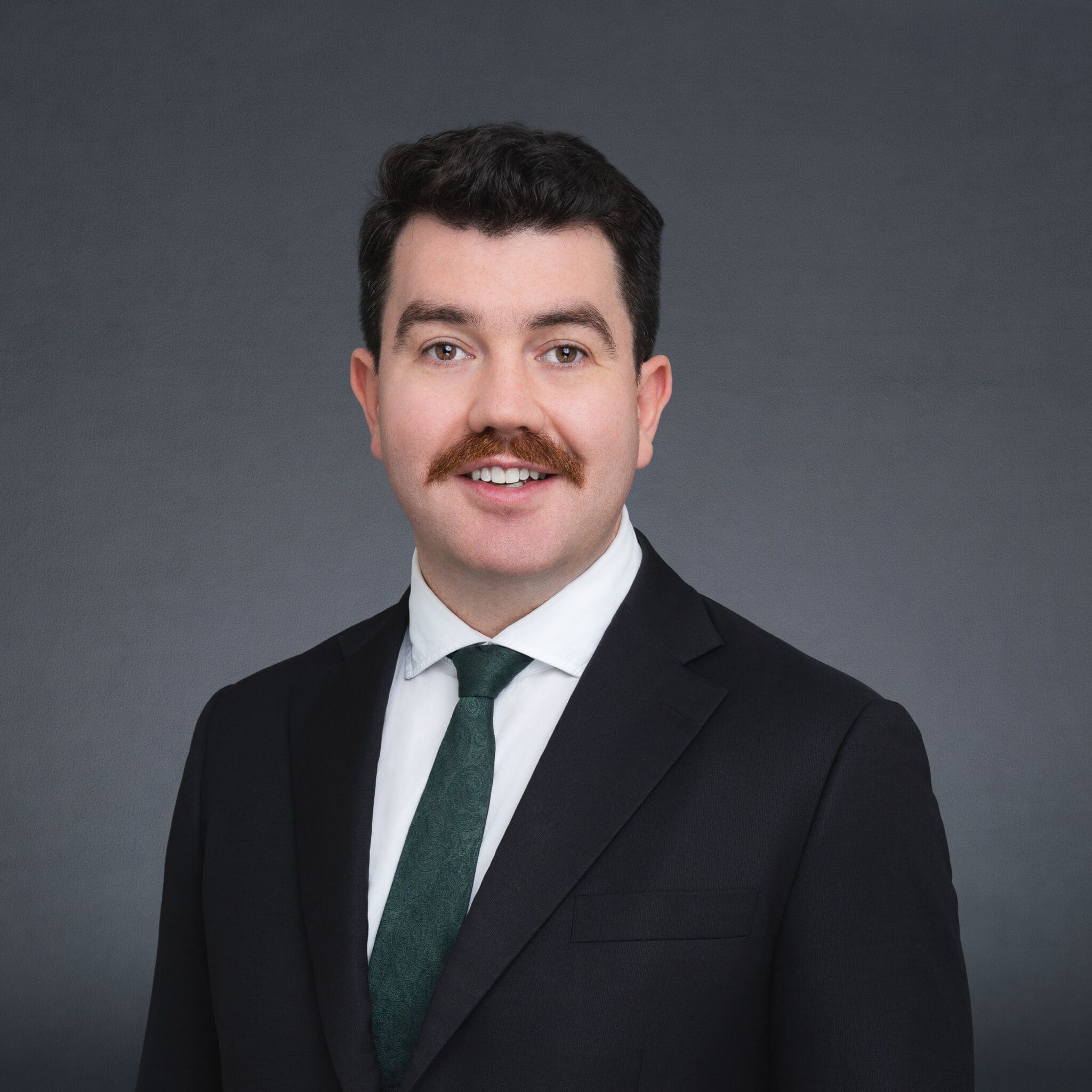 Lawyer wearing black and having his Sydney headshot taken by Sydney headshot photographer Georgie