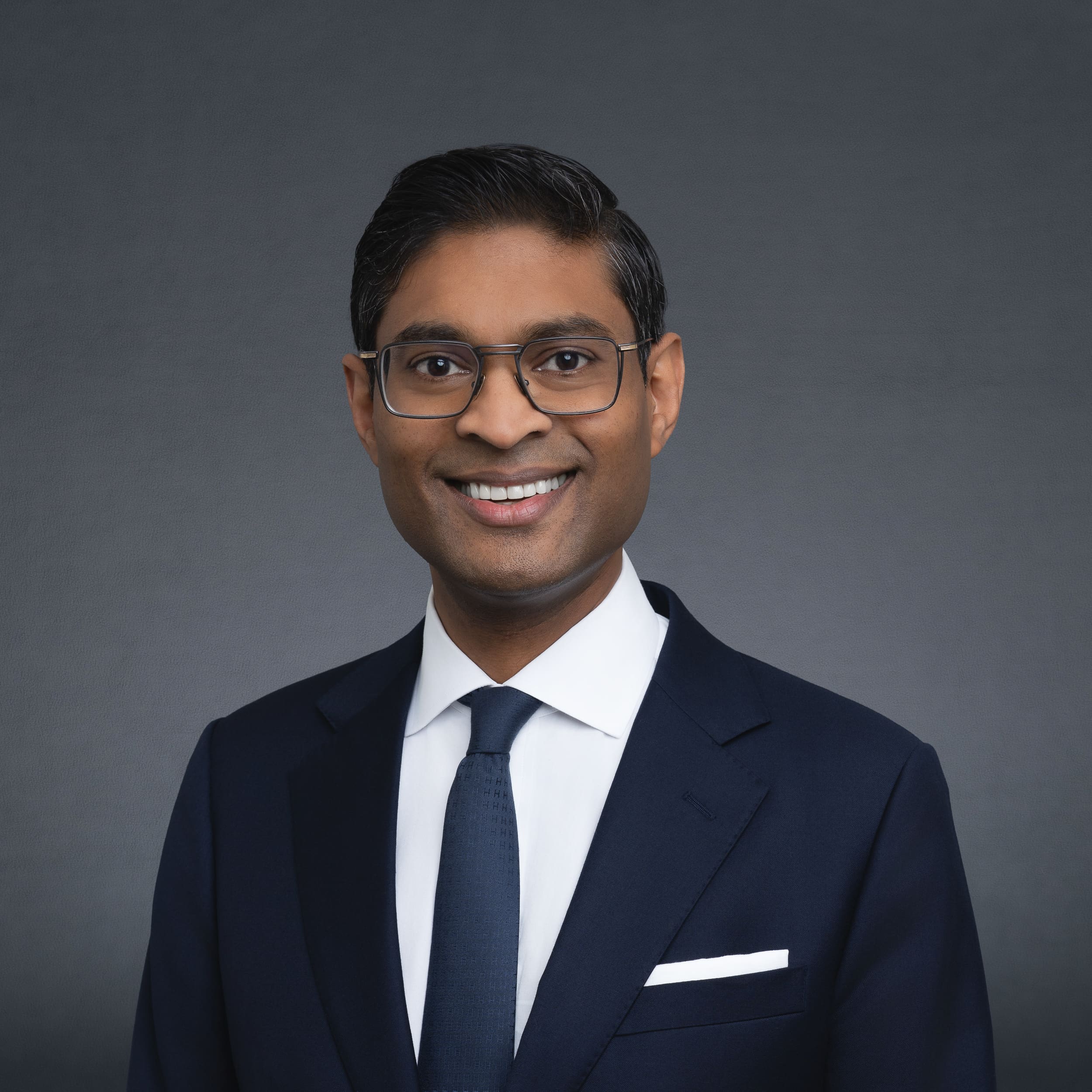 Sydney-Legal-Headshots-NSW Indian Lawyer wearing black and having his professional headshot taken by Sydney Professional photographer Georgie Greene