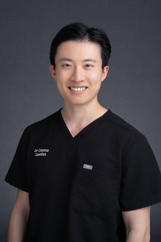 Dentist-Headshot-Sydney-NSW Young Asian Dentist wearing his medical scrubs having his headshot taken by Sydney headshot photographer Georgie Greene