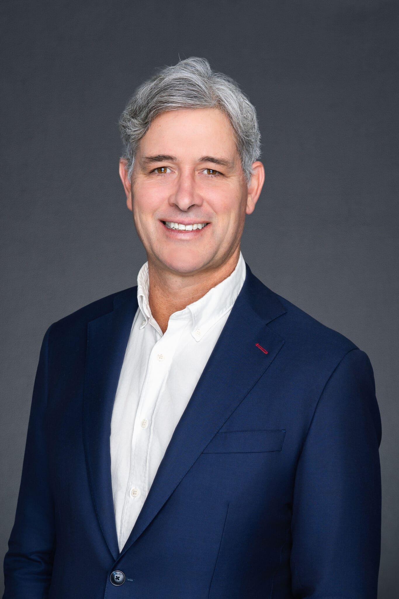 Middle-aged man wearing a blue suite having his headshot taken by Sydney professional photographer Georgie Greene