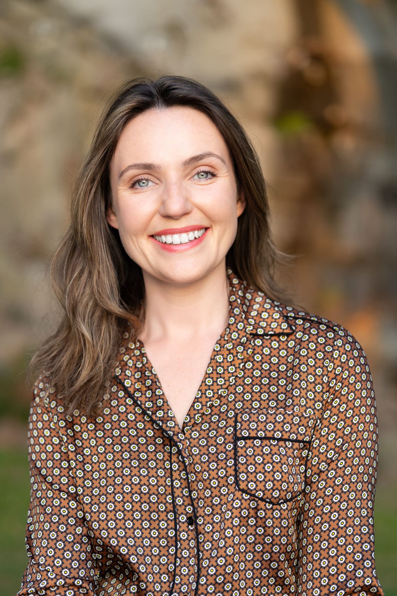 Young woman in a brown top having your branding headshot taken by headshot photographer Georgie Greene Sydney NSW
