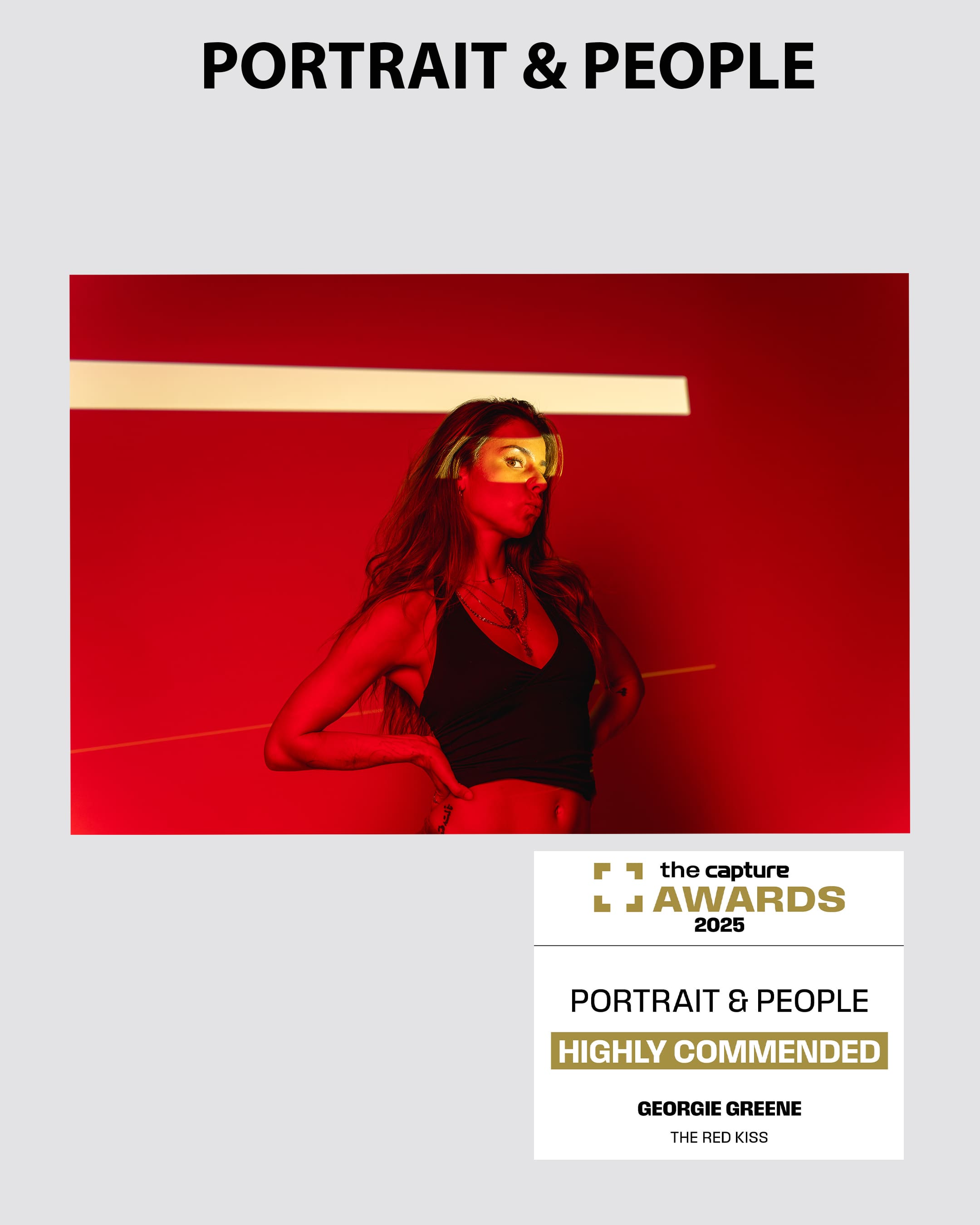 Capture-Mag-Portrait-Photography-Award-b-2025-Sydney-Australia Portrait of a model in red light kissing the air