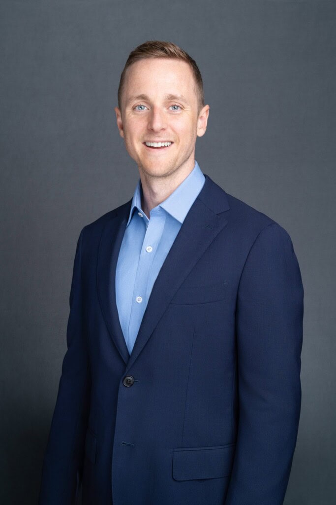 Finance-Manager-Headshot-Sydney-NSW Sydney headshot of a young man wearing a blue suit and shirt