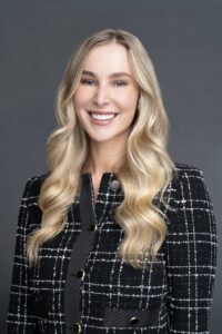 Real-Estate-Agent-Headshot-Sydney-NSW – Professional Photographer Sydney Sydney headshot of young blonde woman wearing a checked jacket