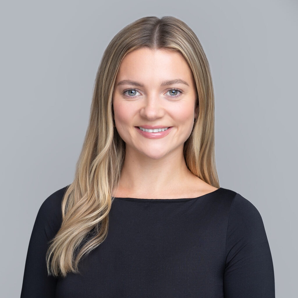 Smiling blonde professional girl having her headshot taken by Sydney headshots photographer Georgie Greene Photography