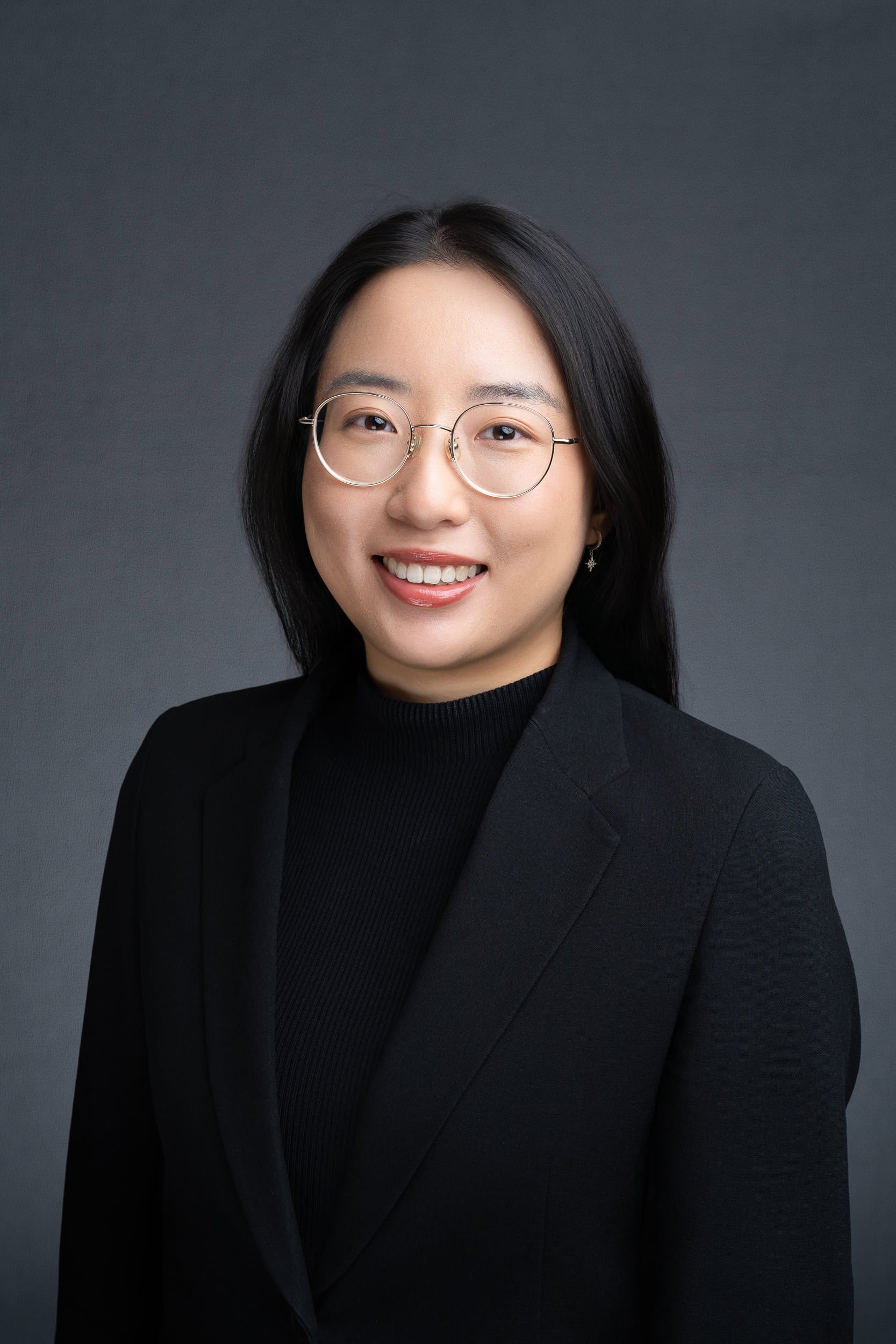 Legal-Headshot-Sydney Chinese woman wearing black having her headshot taken by Sydney professional photographer Georgie Greene