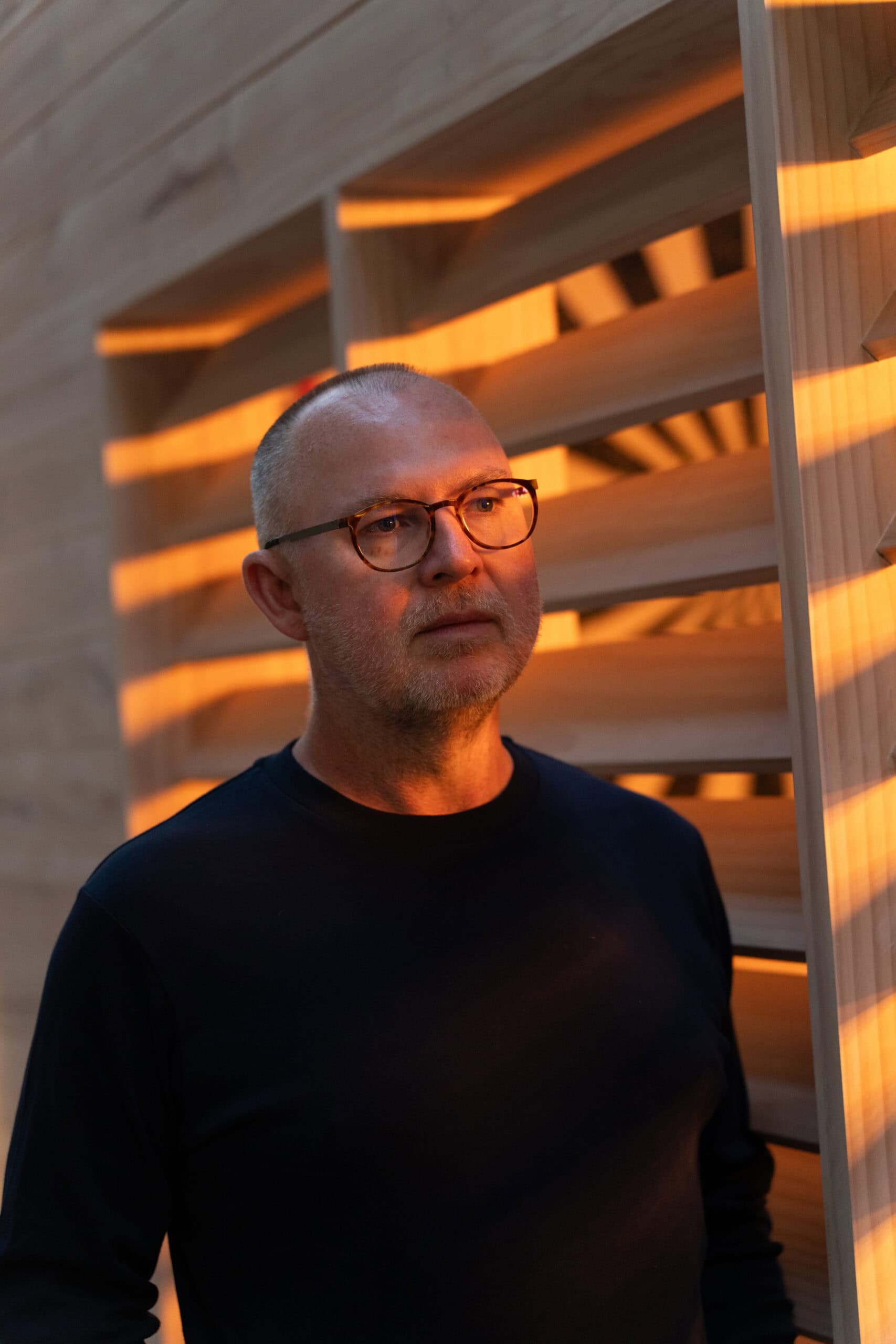 personal branding portrait of a man wearing glasses taken by professional photographer Georgeie Greene