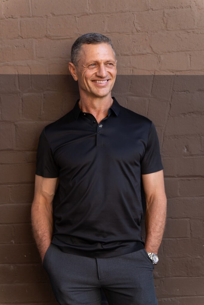 older man in a black shirt having his dating portrait taken by Sydney dating photographer Georgie Greene