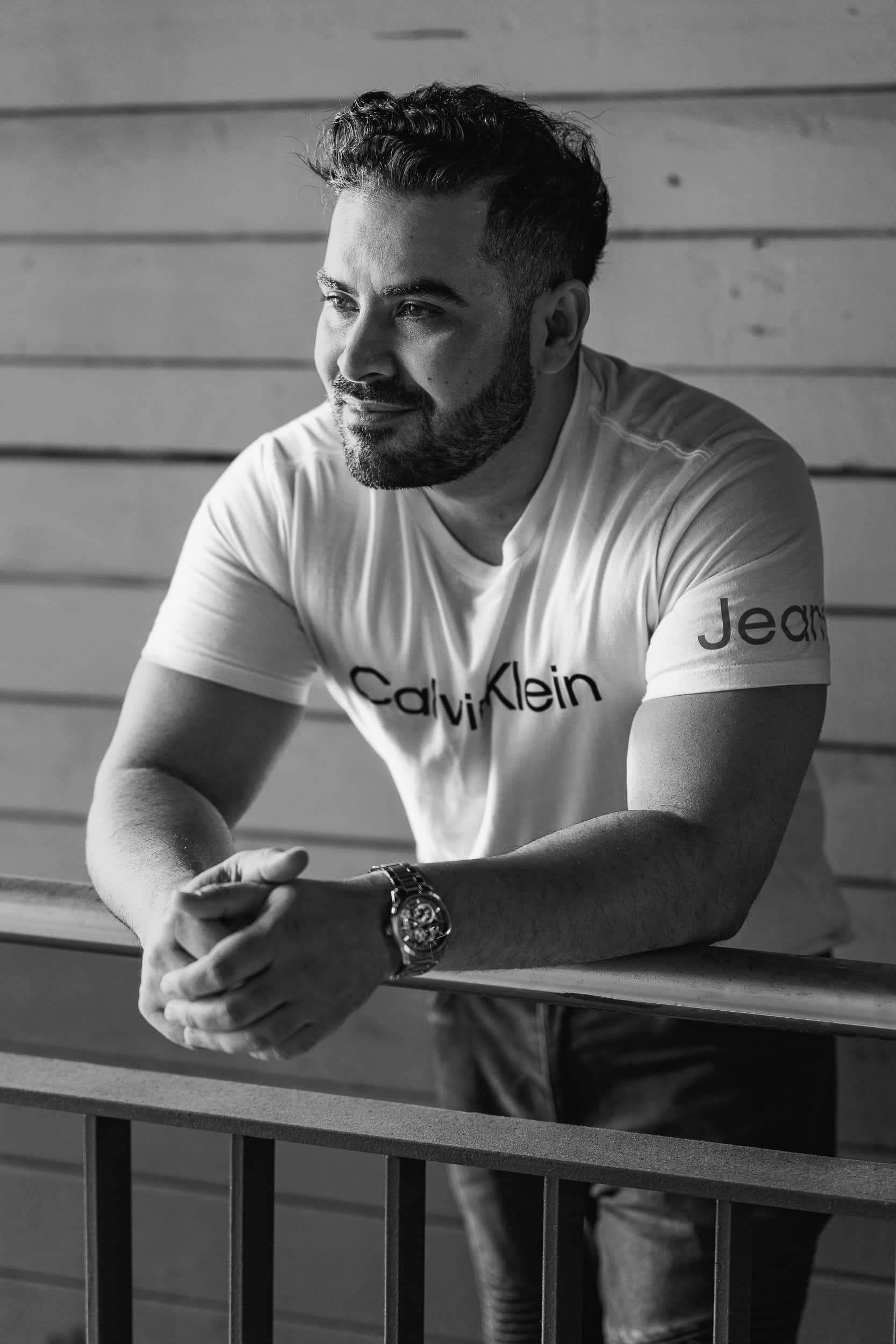 Man with a beard wearing a white t-shirt having his dating portrait taken by Sydney dating photographer Georgie Greene