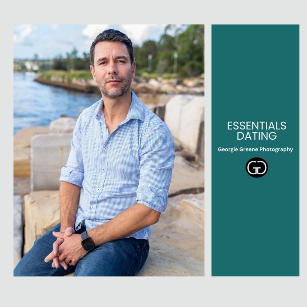 Portrait of a man in a light blue check shirt sitting on a sandstone block by water, next to a teal promotional panel that reads ‘ESSENTIALS DATING’ by Georgie Greene Photography.