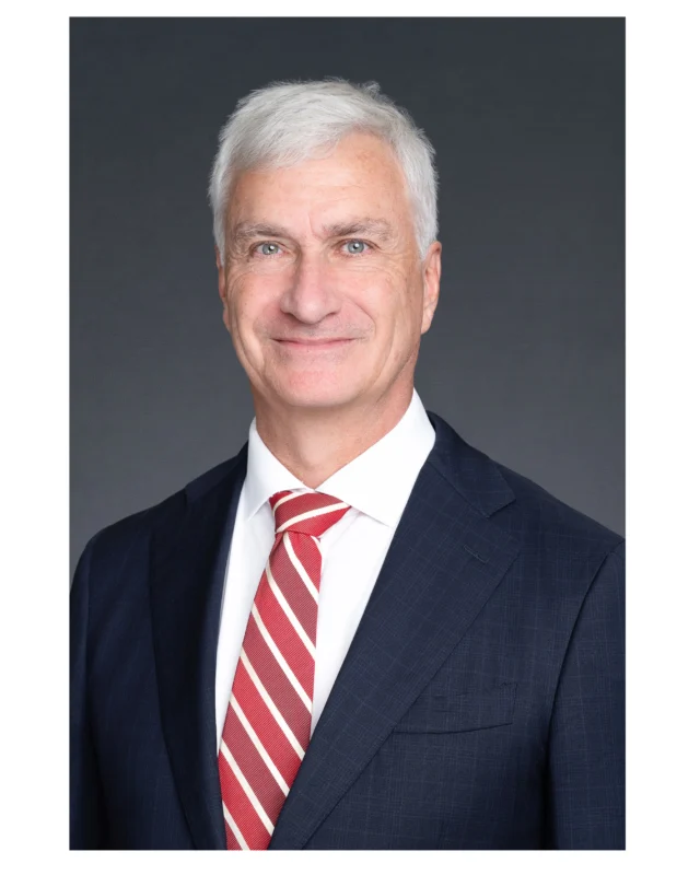 My client presented me with about 50 ties and asked me to choose. I went for the bright red striped one, that screams confidence and positivity. Great for a top Sydney corporate lawyer. His headshot pops on LinkedIn.